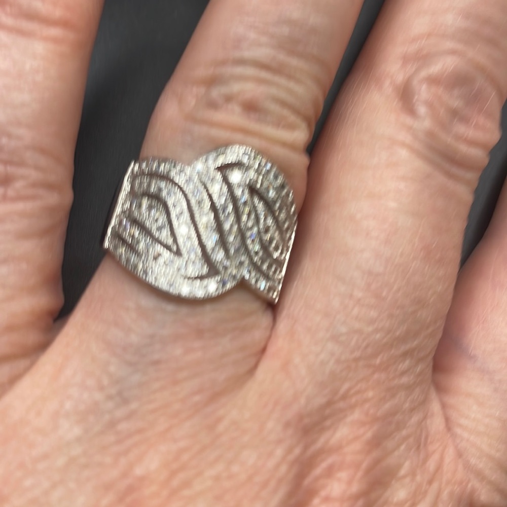 This is 925 sterling silver ring of all clear stones not diamonds.
